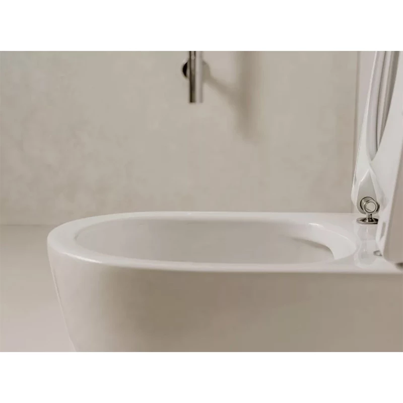 Roca Ona mély öblítésű, öblítő perem nélküli fali wc, ovális 530*360*390mm, rejtett rögzítéssel és rögzítő elemek, fehér